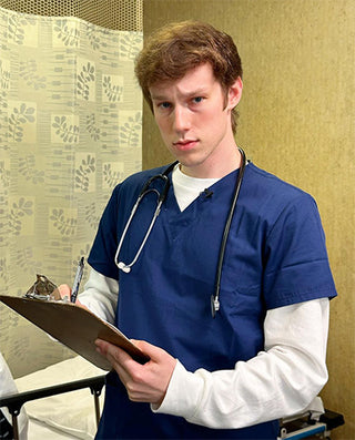 Pictured: Nolan as a doctor